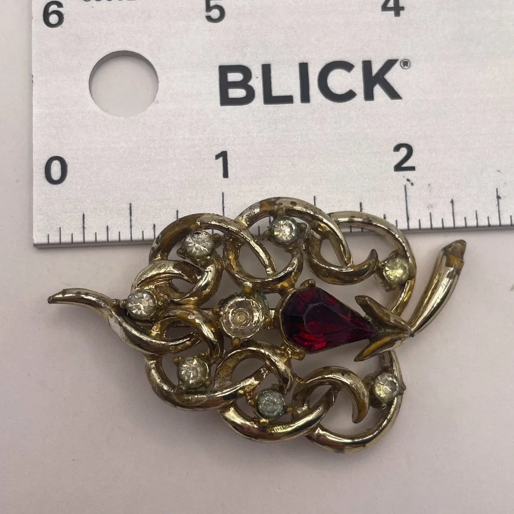 Vintage Gold Tone Red Pear Rhinestone Openwork Shield Filigree Statement Brooch